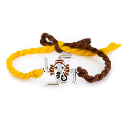 best Ganesha swastik silver yellow and brown thread rakhi