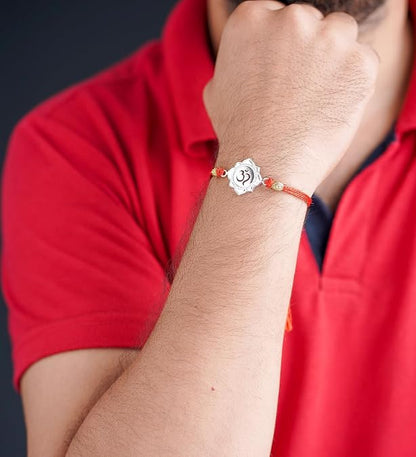 99.5% Pure Silver Rakhi  Om  designs on red thread, premium handcrafted Raksha Bandhan rakhi with authenticity certificate.