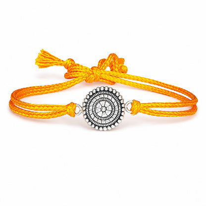 99.5% Pure Silver Sudarshan Chakra Rakhi for Brother | Adjustable Yellow Thread Rakhi | Spiritual Raksha Bandhan Gift | Handmade Rakhi | Madhaviya Jewels