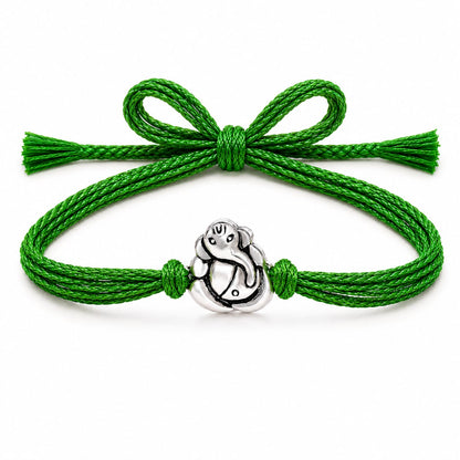99.5% Pure Silver Ganesha Rakhi with Green Thread for Brother by Madhaviya Jewels