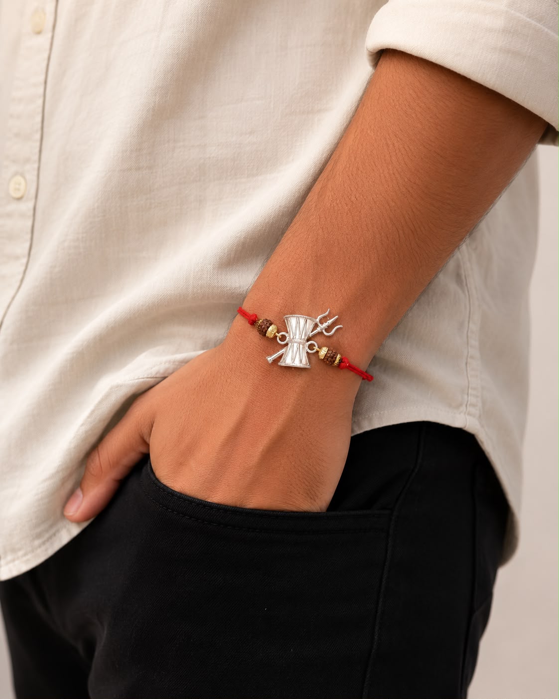 Silver Mahadev Damru Trishul Rakhi for Brother  wear on hand with red thread for Raksha Bandhan by Madhaviya Jewels